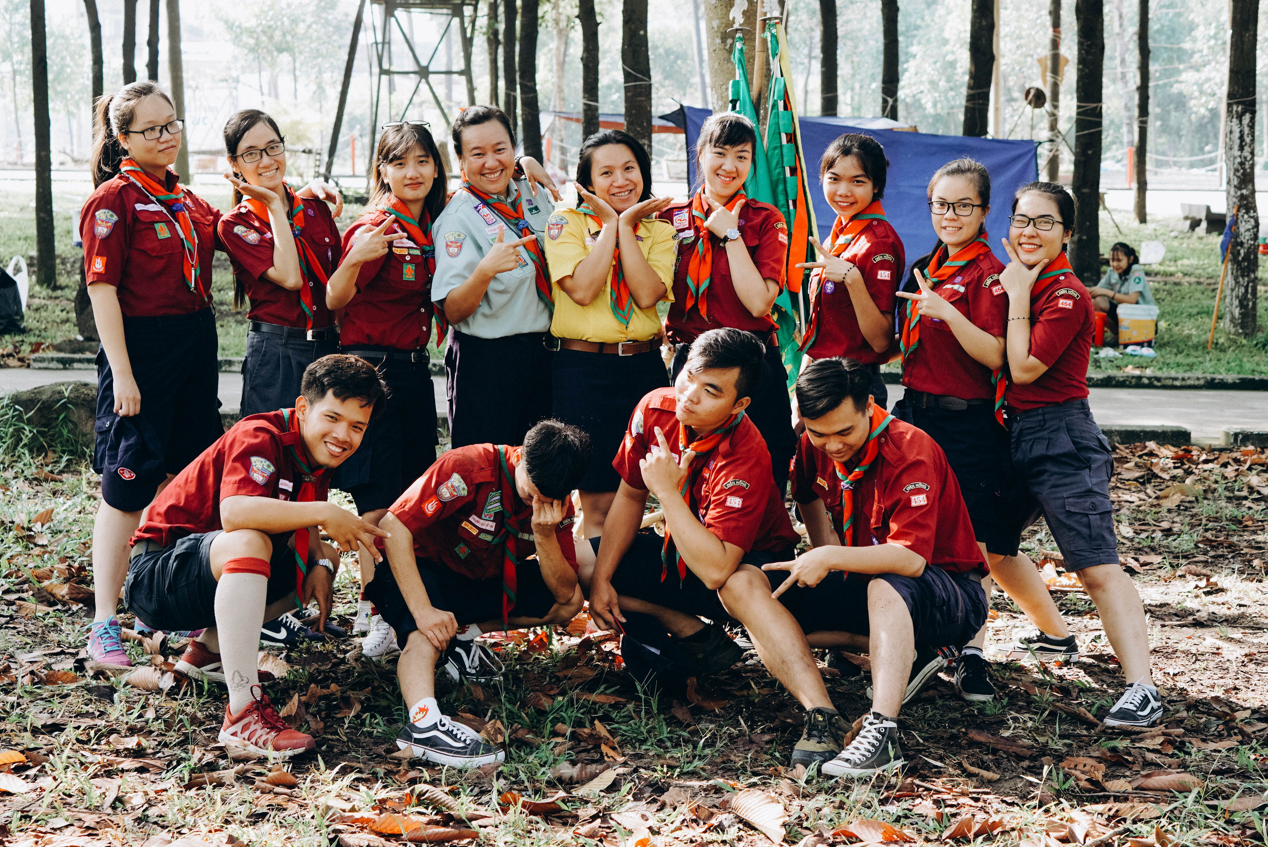 Youth Scout Group in a Playful Outdoor Setting · Free Stock Photo