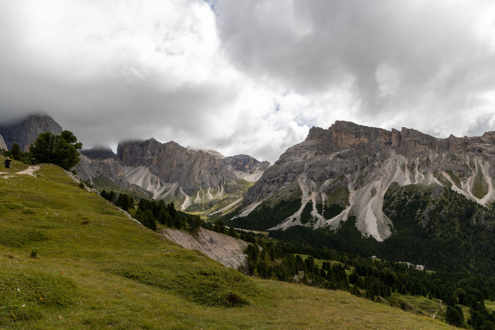 Majestic mountain landscape under cloudy sky in the Dolomites during late afternoon