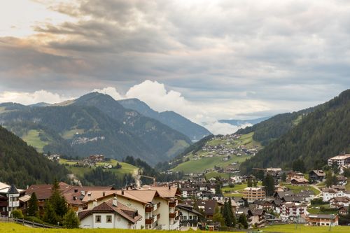 Free Charming mountain village in Selva di Val Gardena, Italy with stunning landscape views. Stock Photo
