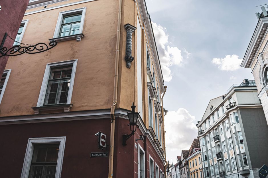 How to Build a CD Ladder to Maximize Your Returns Efficiently Charming old town street view in Tallinn, Estonia, showcasing colorful historic architecture under a bright sky.