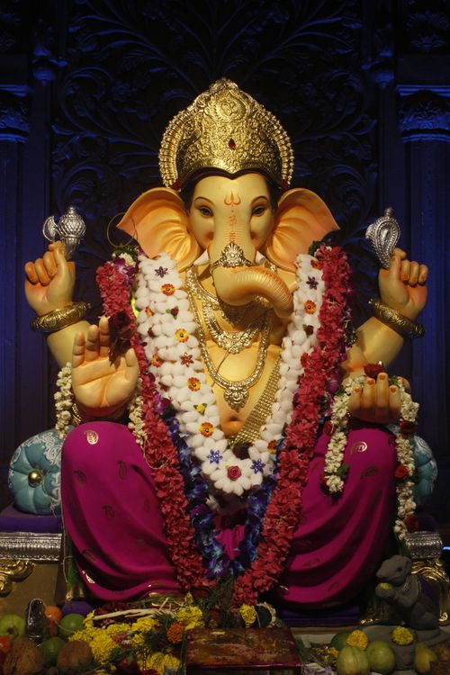Free Colorful Ganesh idol adorned with garlands for Ganesh Chaturthi in Mumbai. Stock Photo