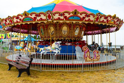 Free A vibrant carousel sits ready for riders at a country fair in West Alexander, Pennsylvania. Stock Photo