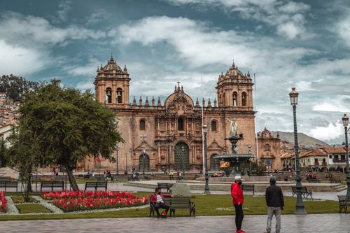 Free Historic Cusco Cathedral at Plaza de Armas, Peru with people in the foreground. Stock Photo