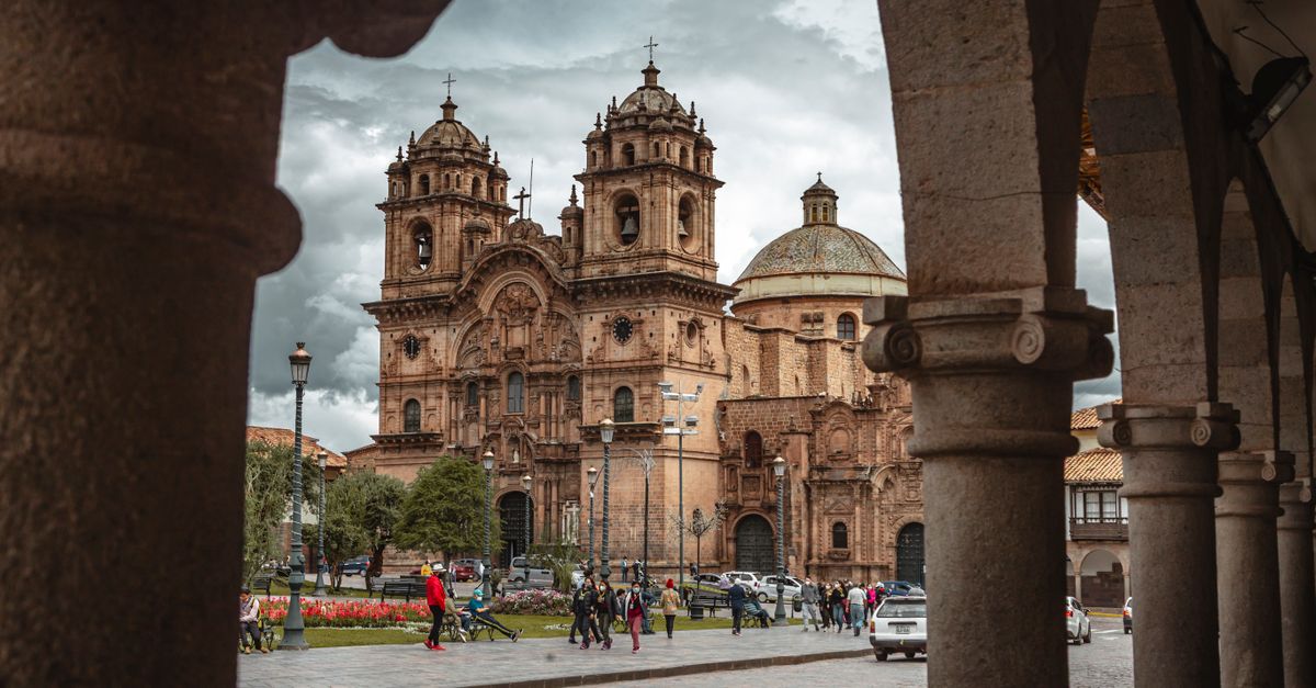 Inca stone walls in Cusco with colonial Spanish architecture built on top