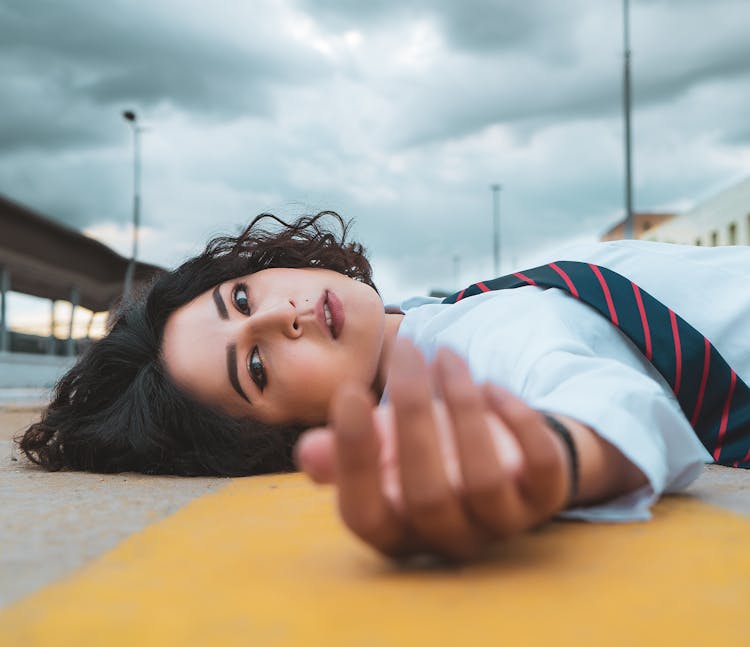 Photo Of Woman Laying On Ground