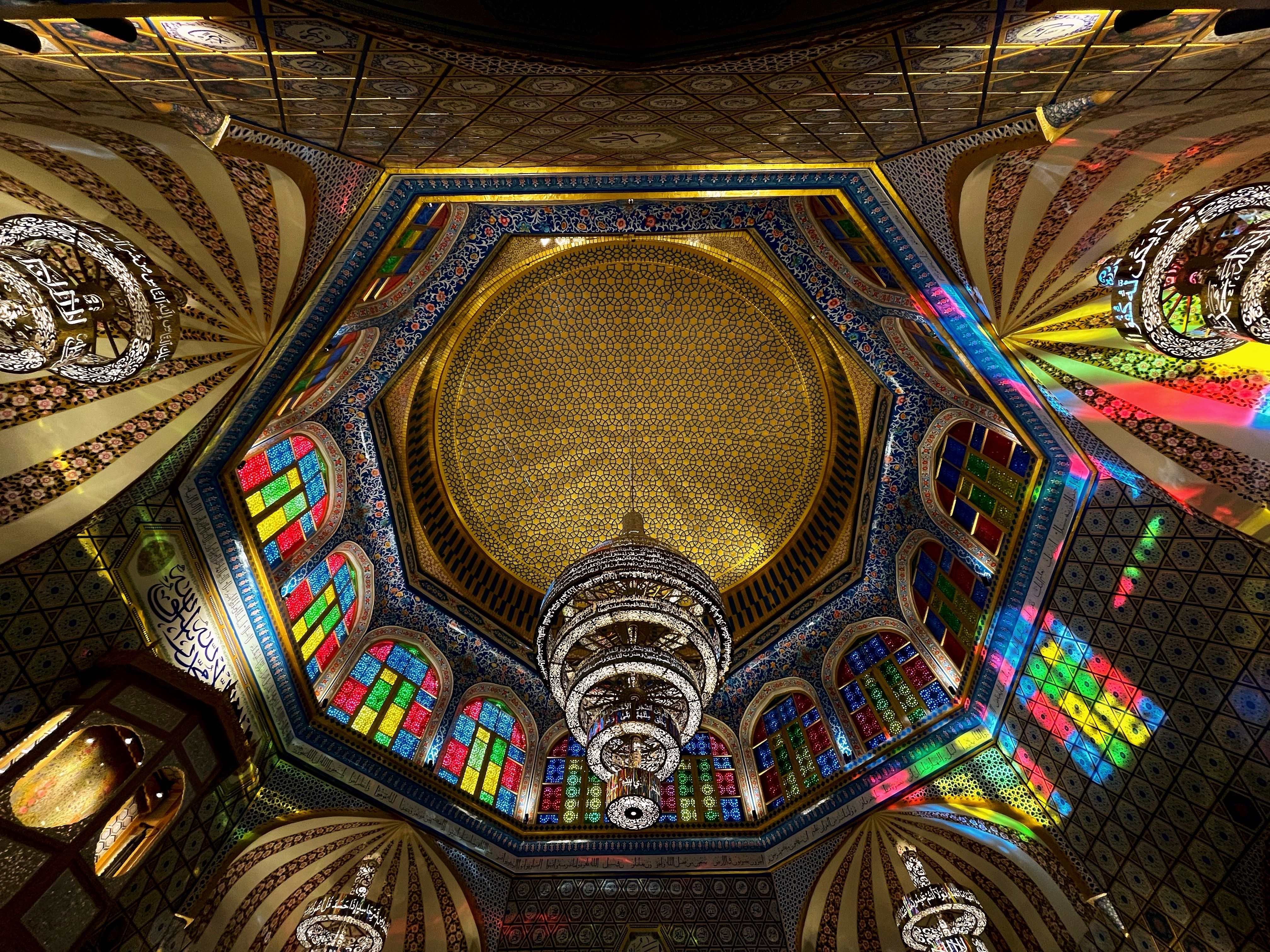 Intricate Islamic Ceiling with Colorful Stained Glass · Free Stock Photo