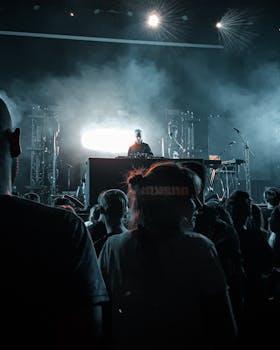 Crowd enjoying a DJ performance at a concert in Utrecht, Netherlands.