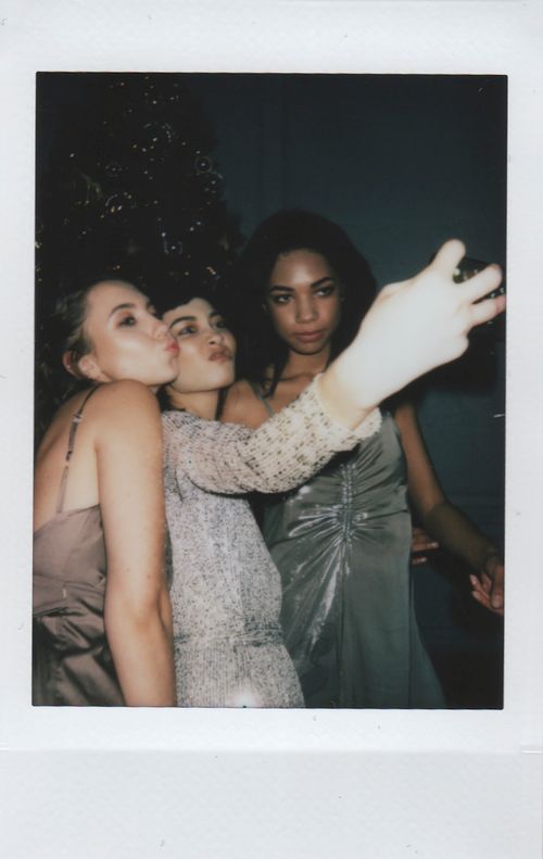 Free Three young women pose for a selfie at a party, capturing a fun moment. Stock Photo