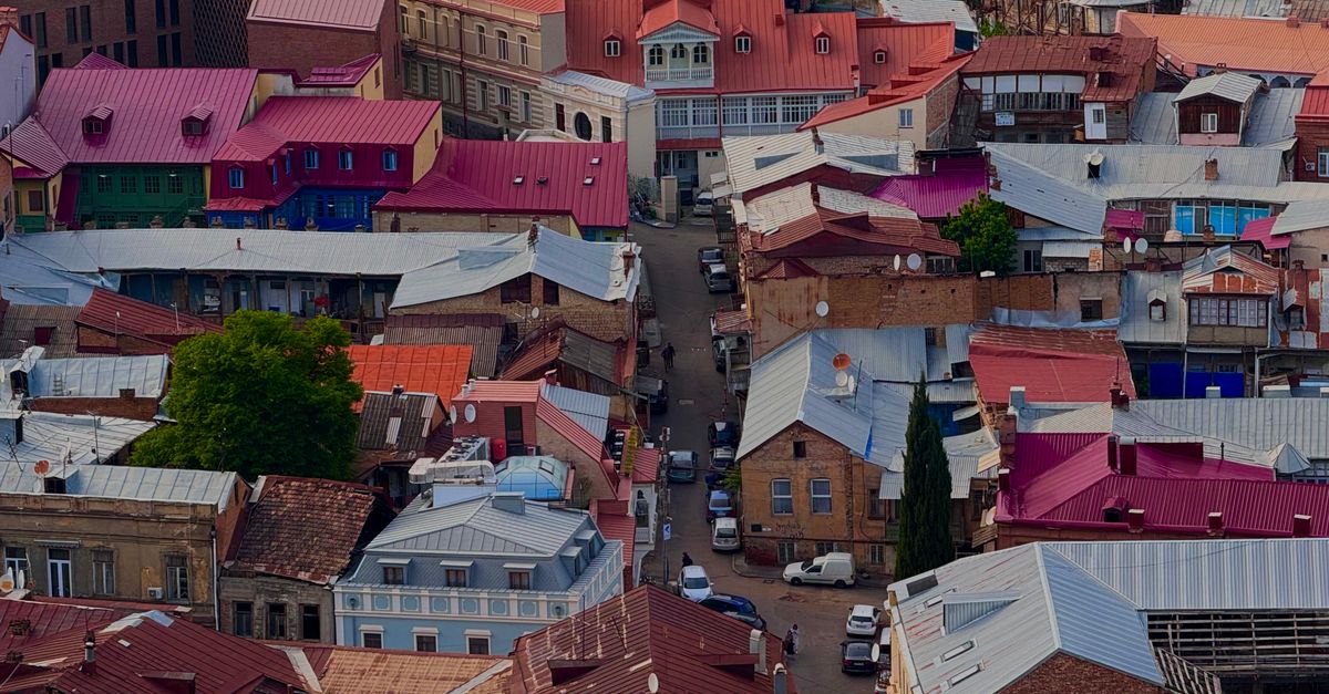 Explore the vibrant and historic rooftops of Tbilisi, showcasing the city's unique architectural charm.