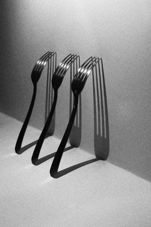 Free Lined Gray Stainless Steel Forks Stock Photo