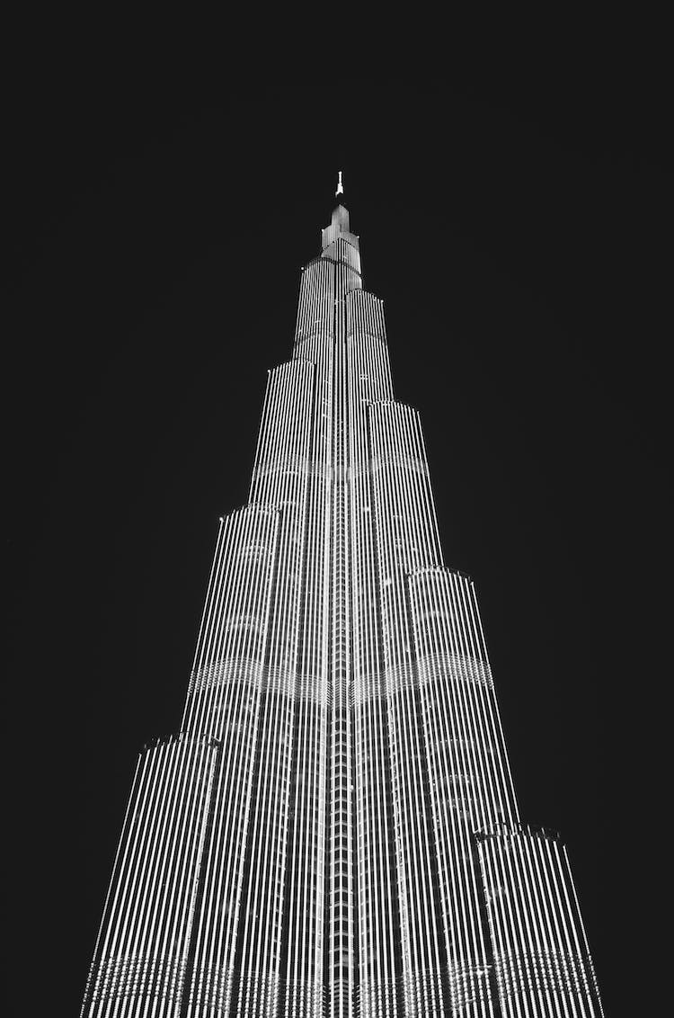 Low Angle View Of Skyscraper Against Sky At Night