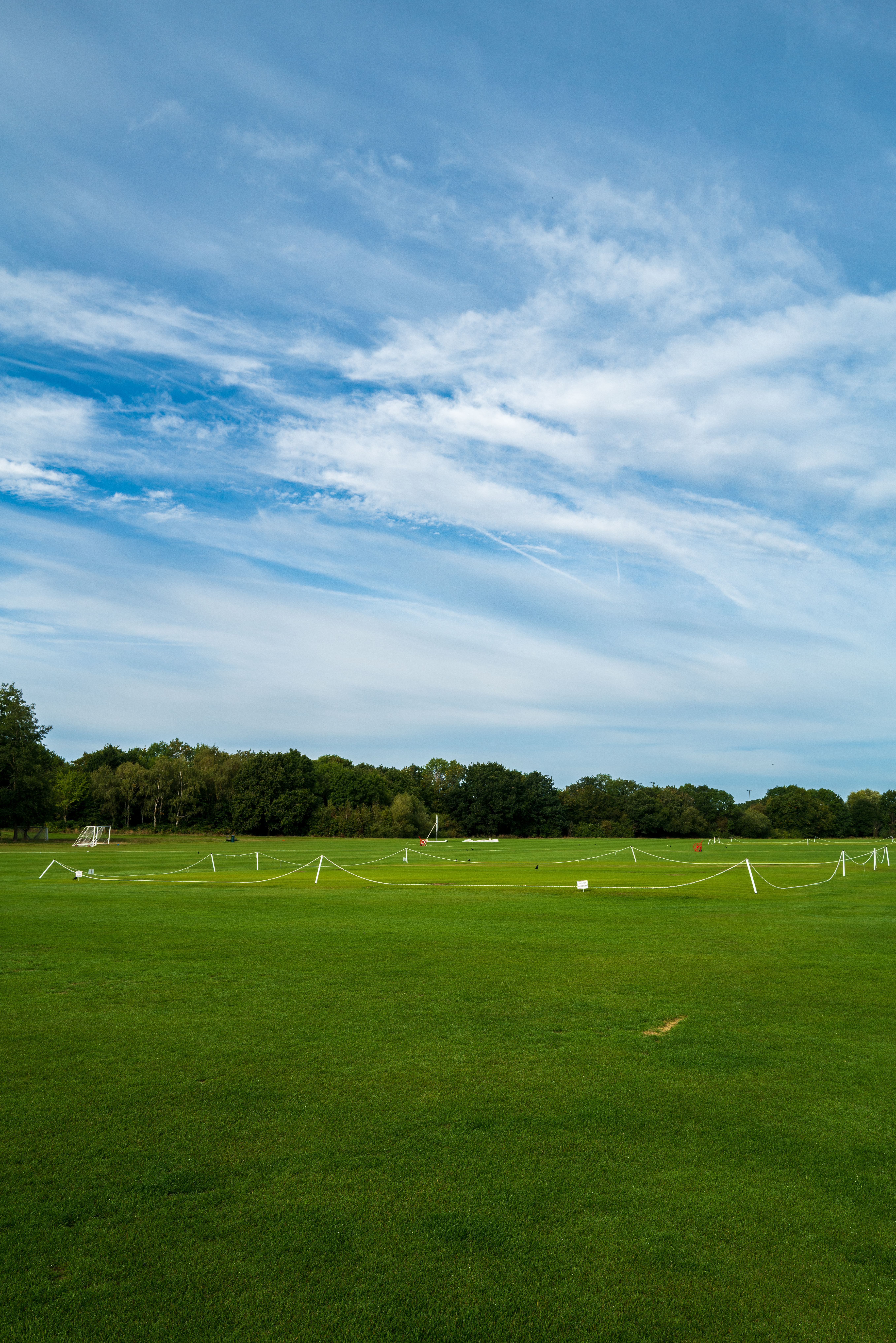 Spacious Green Sport Field Under Clear Sky · Free Stock Photo