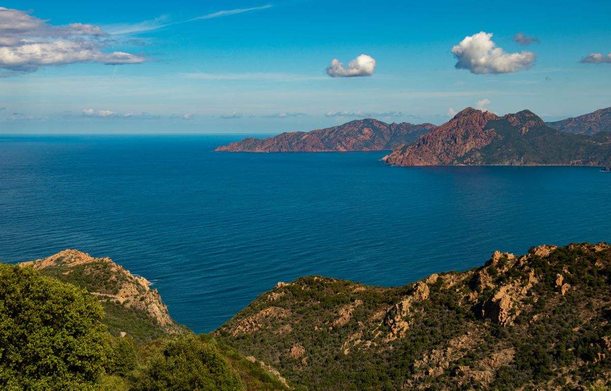 The Gulf of Porto — red headlands, deep sea and maquis hills
