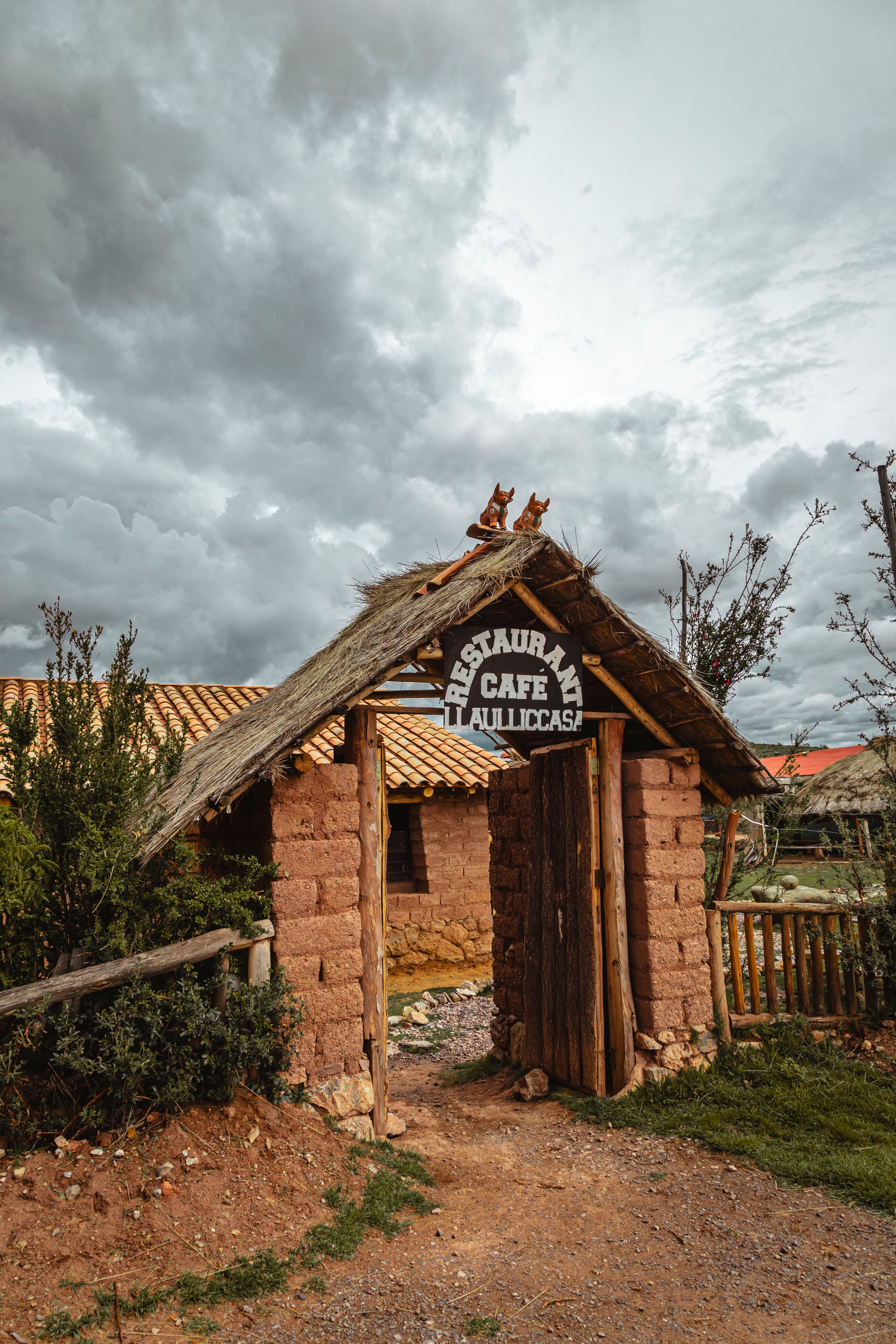 Entrance to Restaurant Café Tiahuanaco in rustic style, Cusco, Peru.