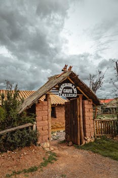 Entrance to Restaurant Café Tiahuanaco in rustic style, Cusco, Peru.