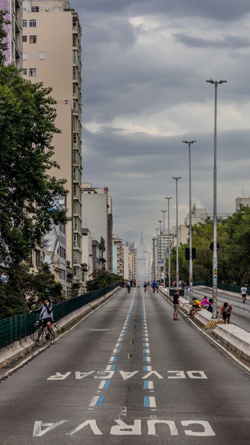 Free A bustling urban street scene in São Paulo, Brazil with people and city buildings. Stock Photo