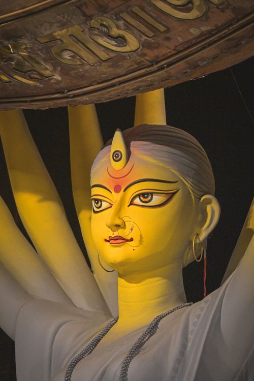 Free Close-up of a vibrant Durga idol during Kolkata's Durga Puja, showcasing traditional craftsmanship. Stock Photo