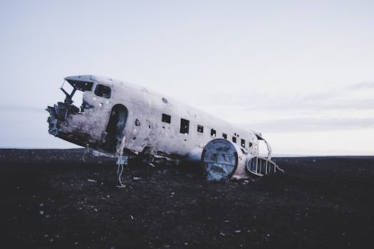 Eerie abandoned DC-3 plane wreck on Solheimasandur beach, Iceland.