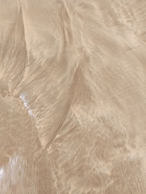 Free Natural abstract patterns formed by sand on a beach in Casablanca, Morocco. Stock Photo