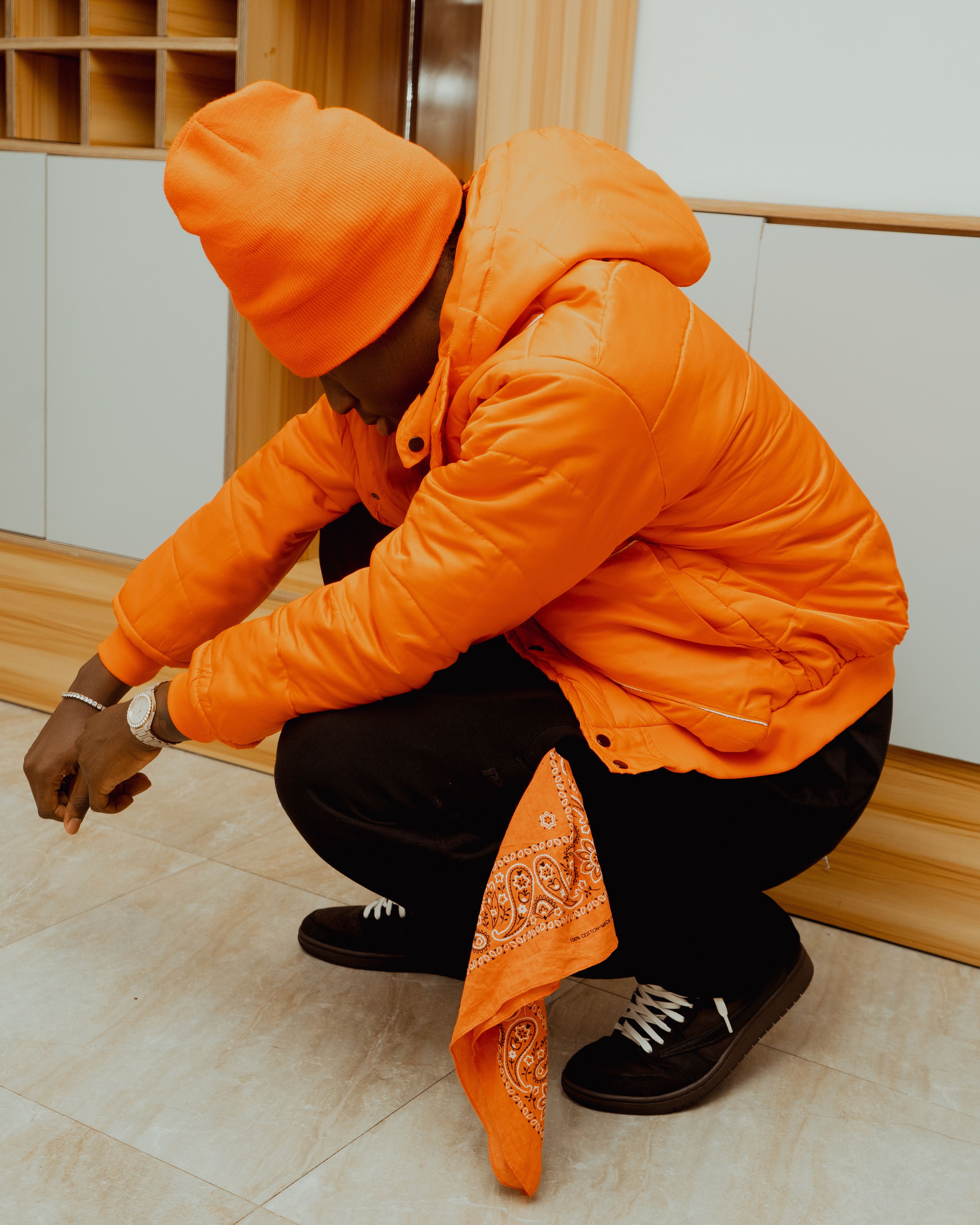 Stylish Urban Fashion with Orange Jacket and Bandana · Free Stock