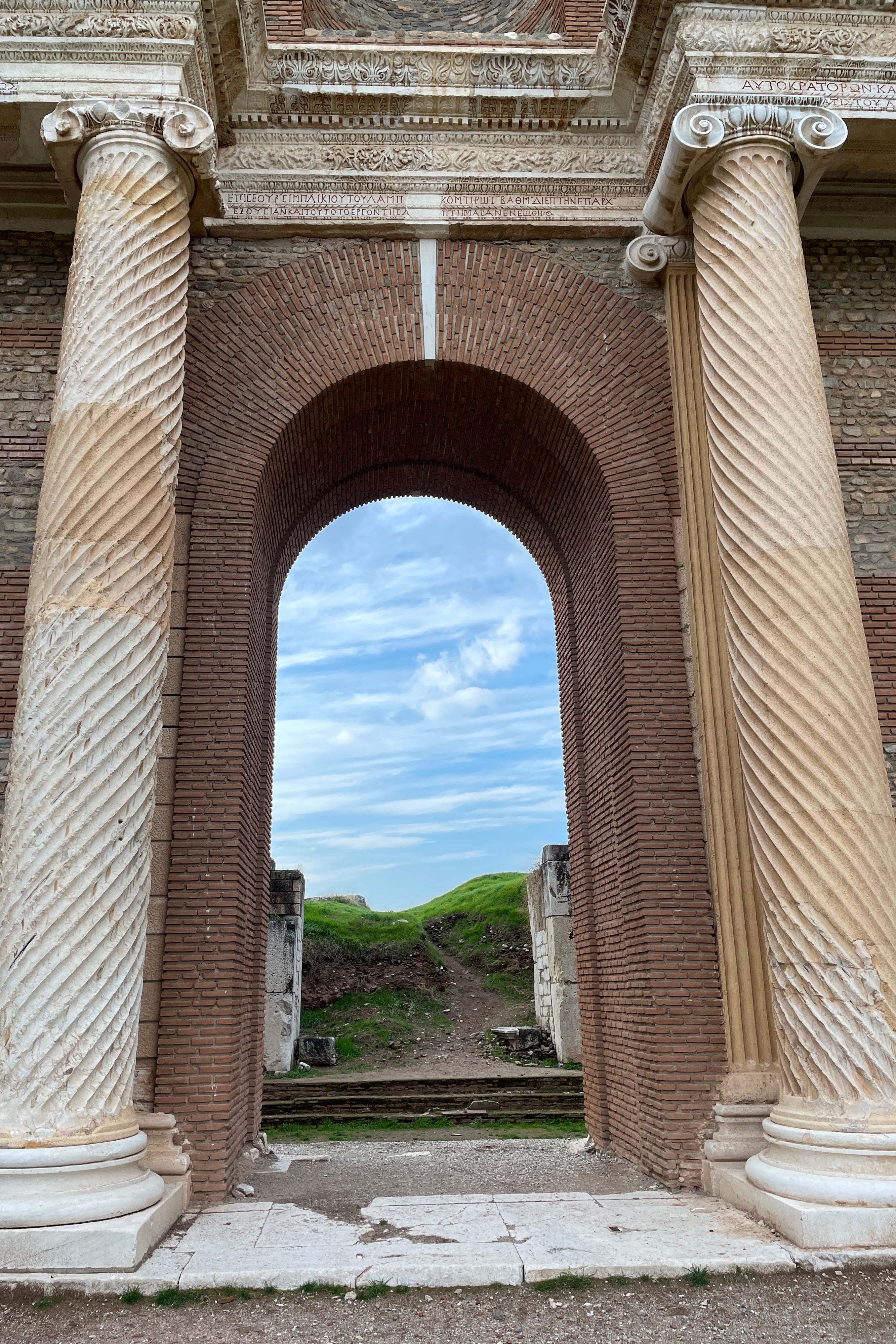Ancient Roman Archway with Twisted Columns · Free Stock Photo