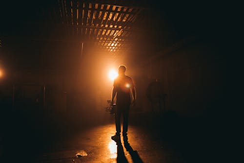 Silhouette Photography Unknown Person Standing Indoors