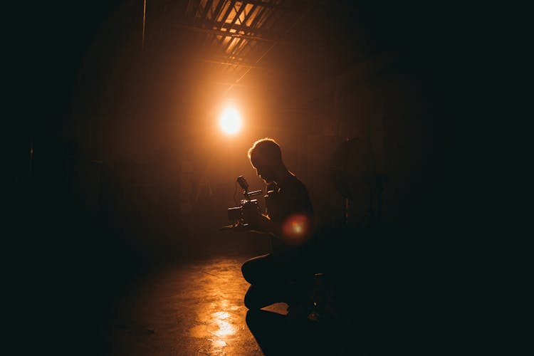 Man Playing Guitar On Stage