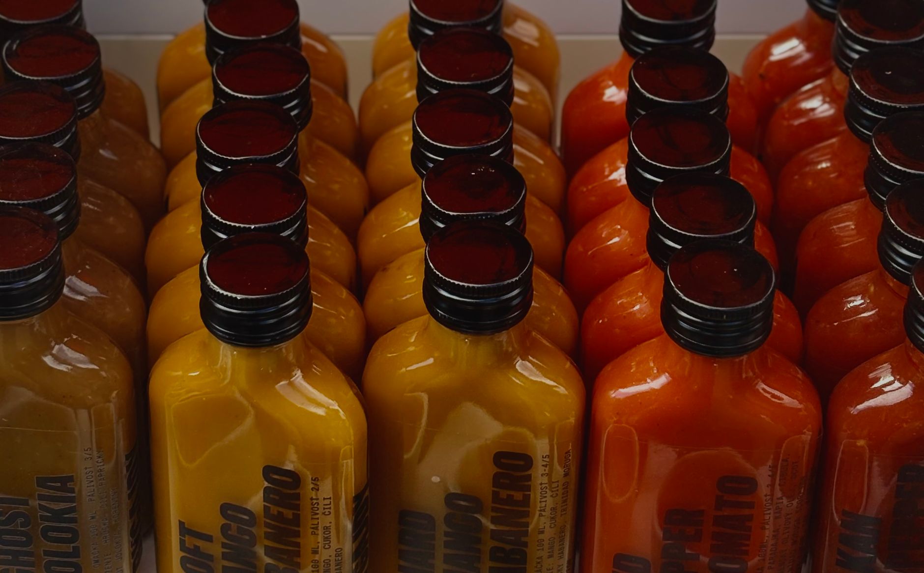 Hot sauces served with grilled food and dipping bowls