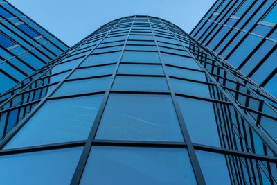 Glass office tower facade — photo by Jan van der Wolf on Pexels