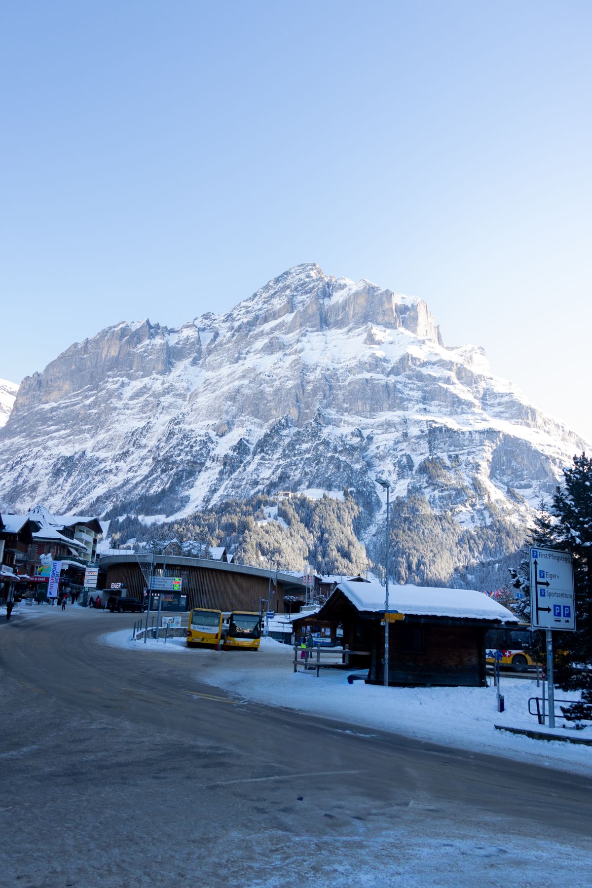 A snow-covered Grindelwald street below the Bernese peaks