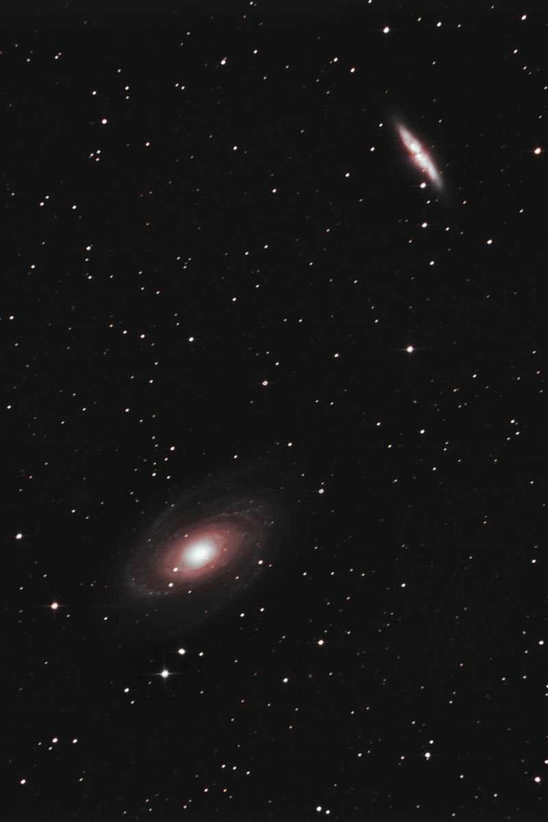 Detailed capture of the stunning spiral galaxy Messier 81 in the night sky.