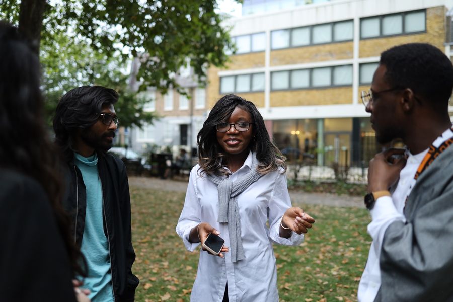 People connecting and sharing experiences in a community setting