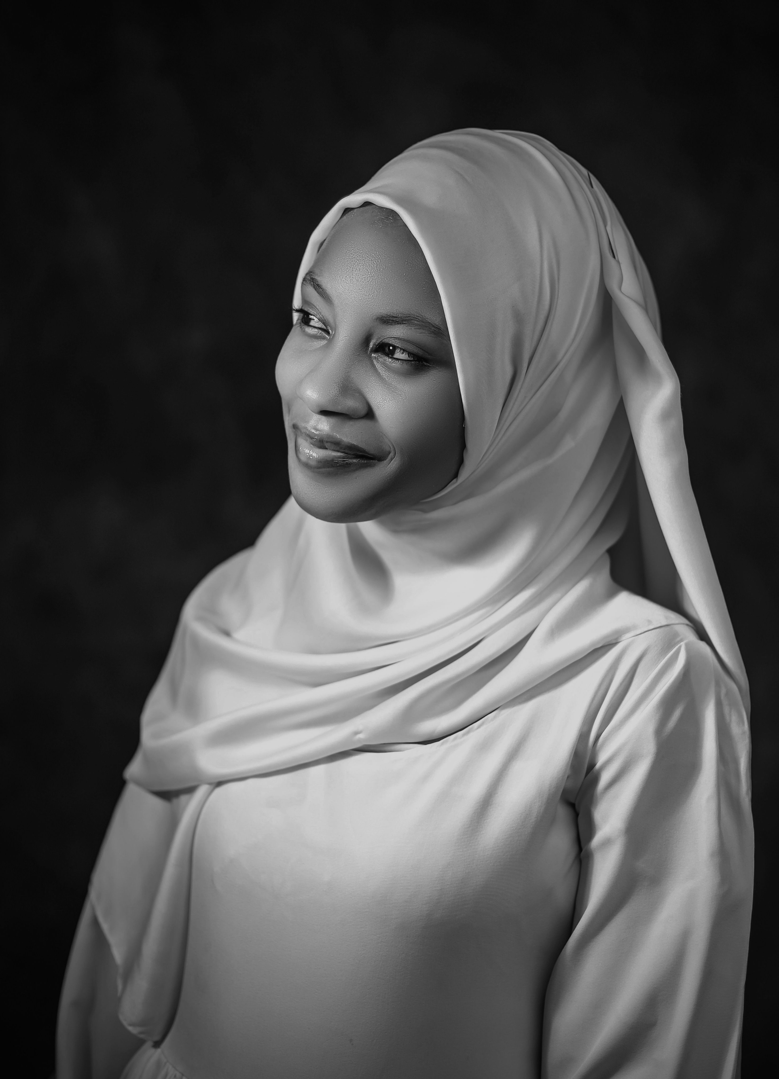 Elegant Black and White Portrait of Woman in Hijab · Free Stock Photo