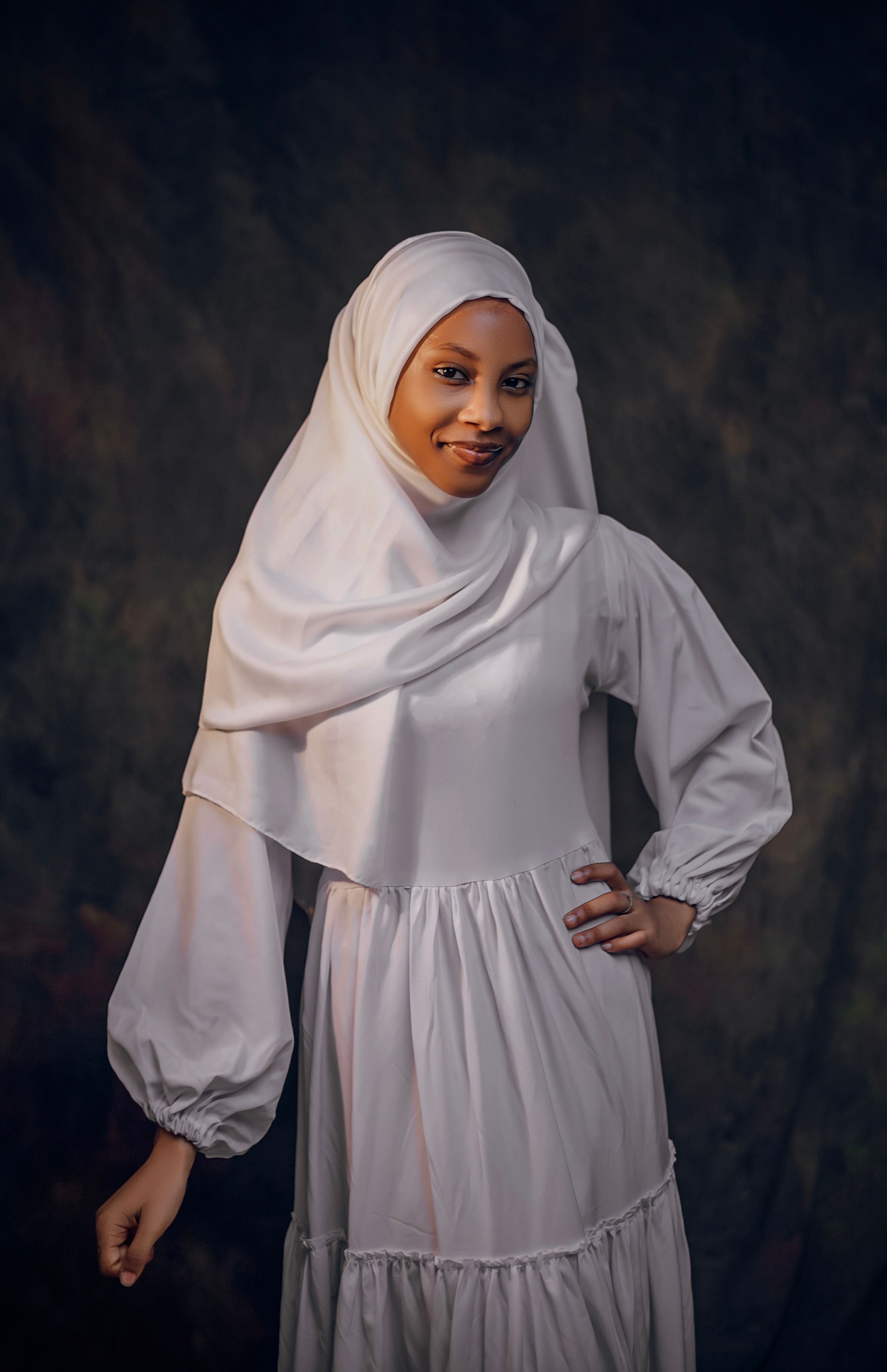 Portrait of a Woman in White Hijab and Dress · Free Stock Photo