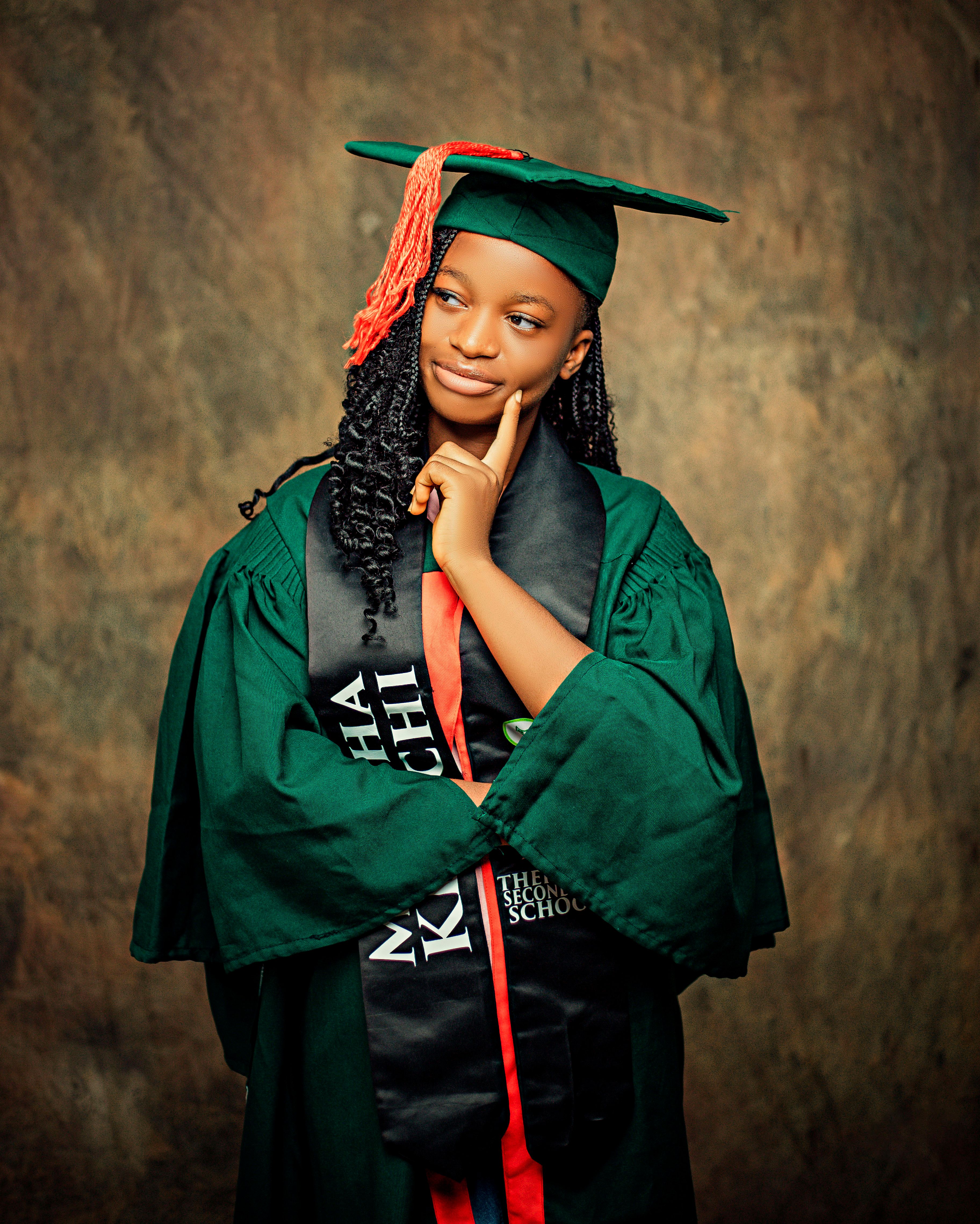 Elegant Teenage Graduation Portrait in Cap and Gown · Free Stock Photo