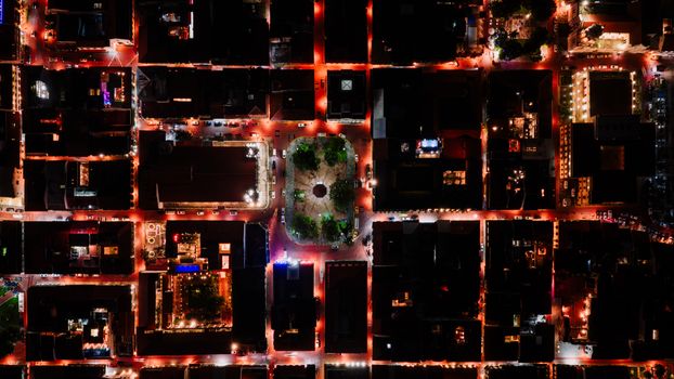 Stunning aerial view of Panama City's illuminated streets at night.