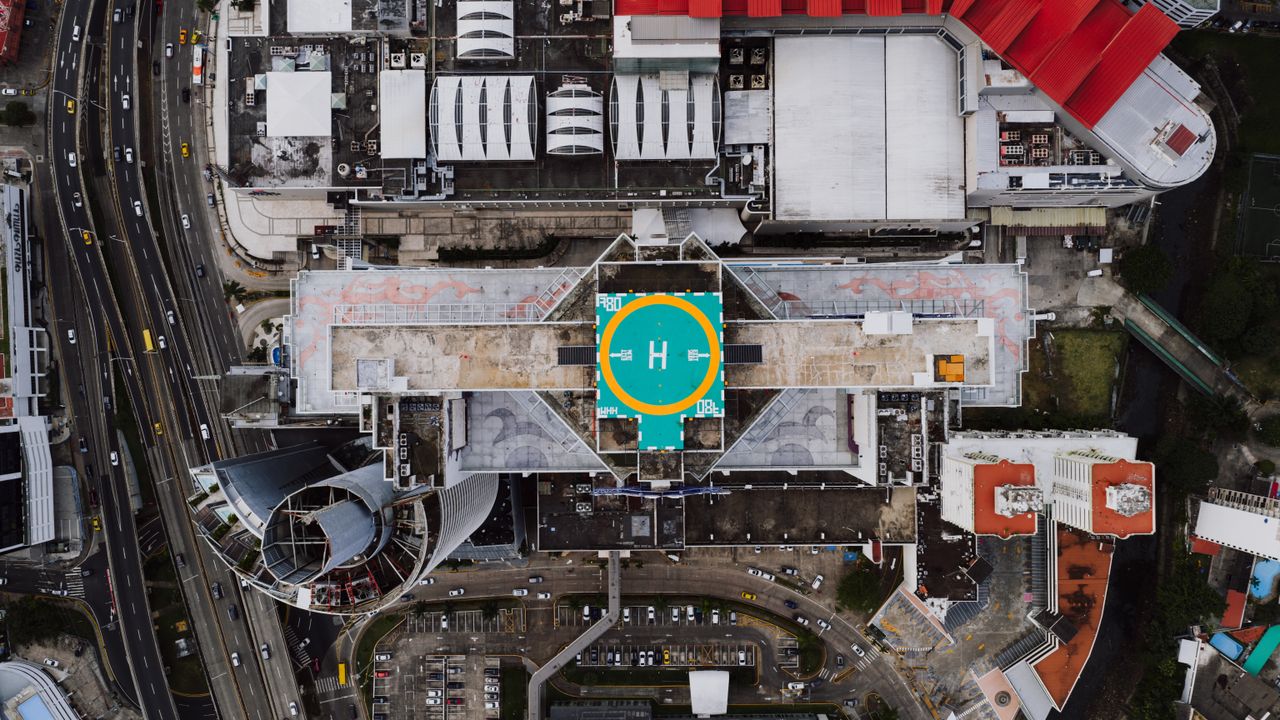 aerial shot of urban architecture in panama city with a prominent heli