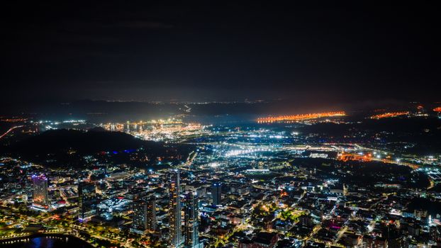 A breathtaking aerial view of Panama City's illuminated skyline at night, showcasing urban vibrancy.