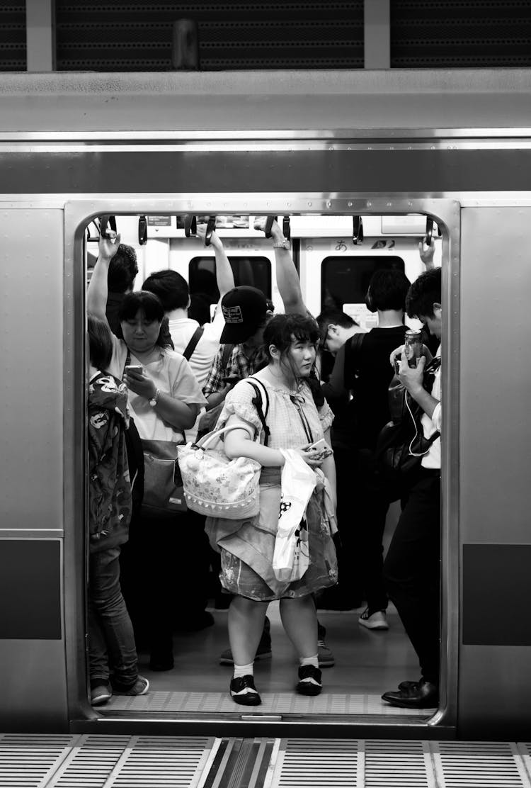 Crowd Of People In Cabin Of Modern Metro