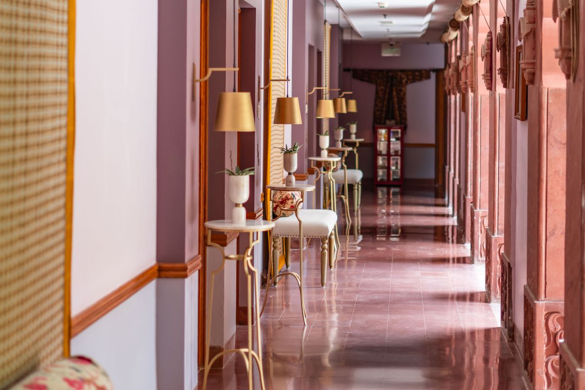 Hotel corridor leading to guest rooms