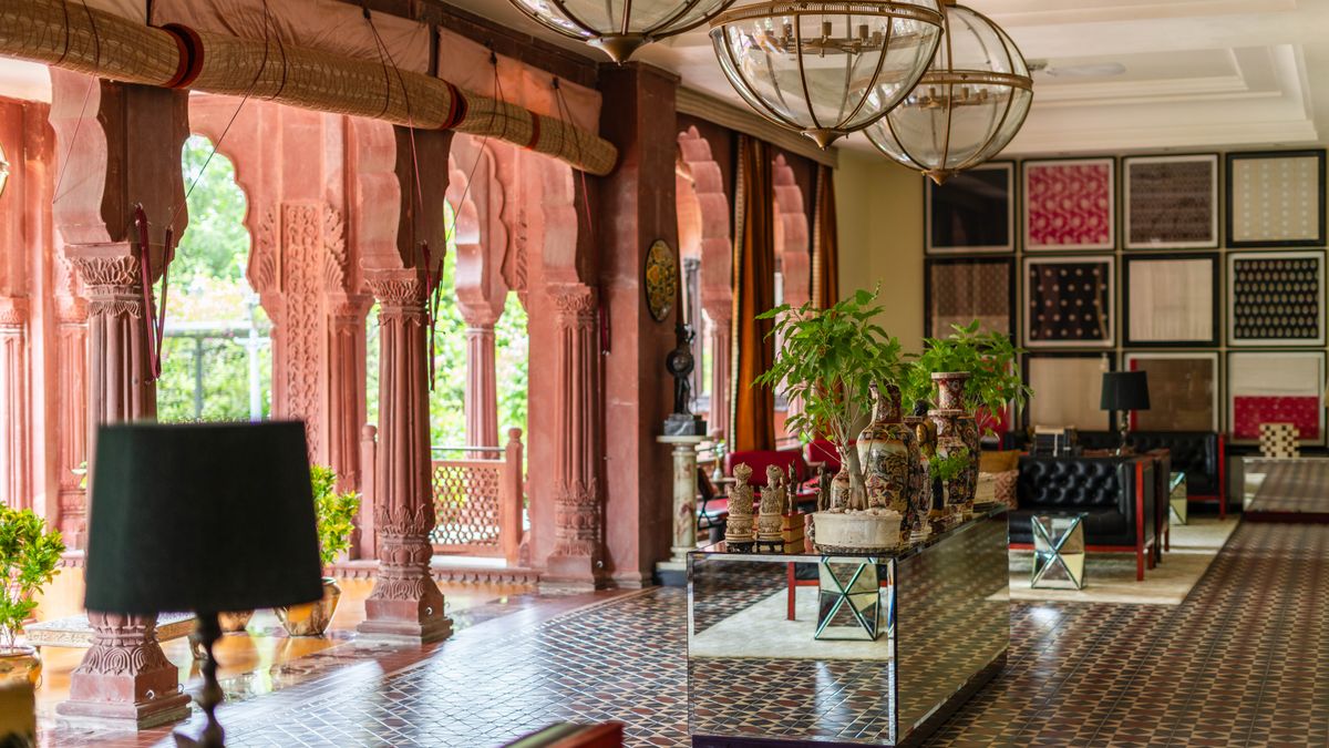Elegant hotel lobby with marble floors and warm lighting
