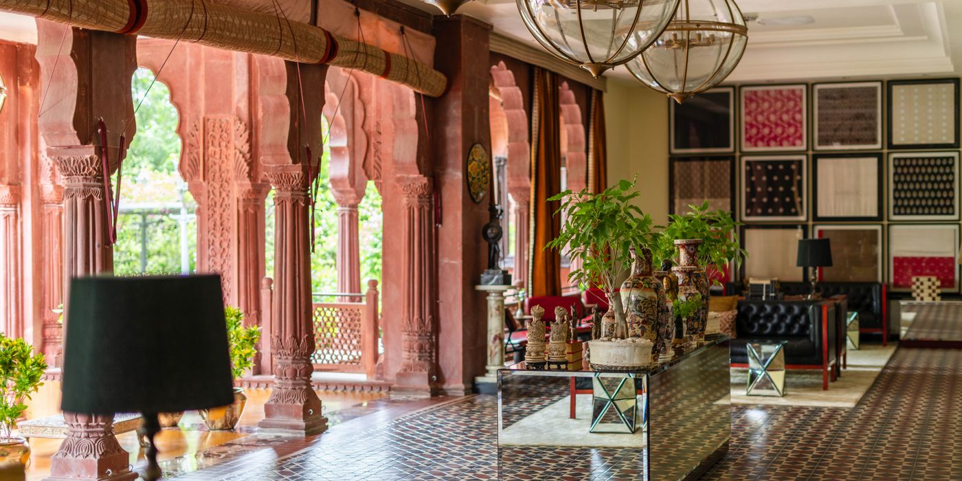 Elegant hotel lobby with marble floors and warm lighting