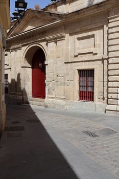 Facade of an ancient building in Jerez de la Frontera, capturing Spanish architectural charm.