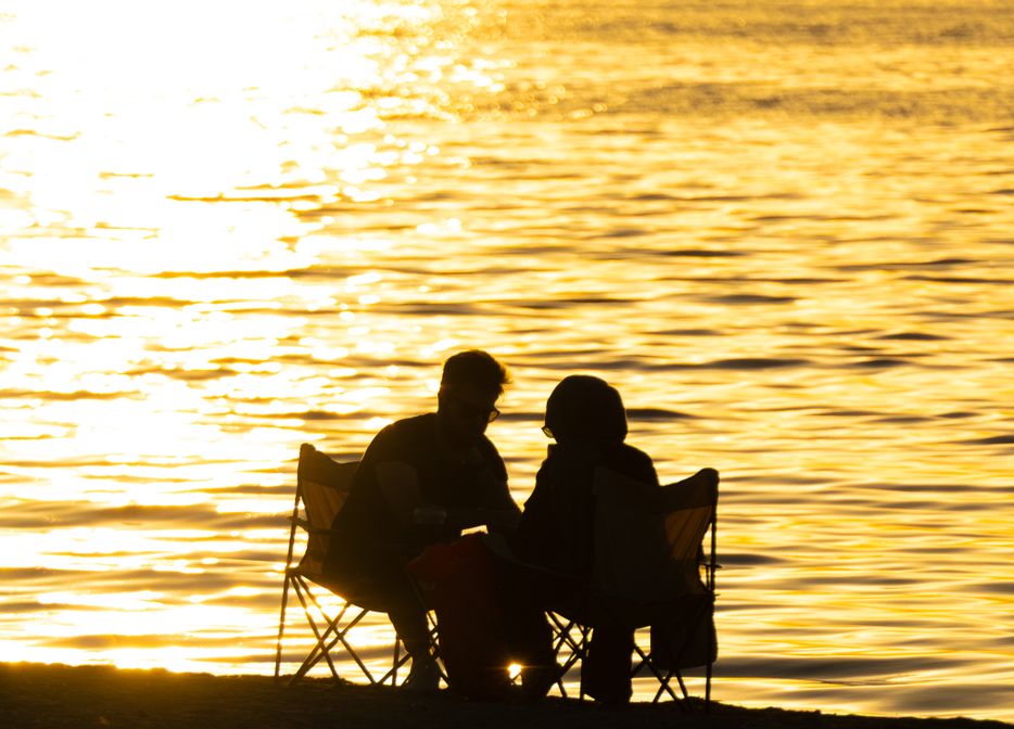 couple dating online messaging on phone