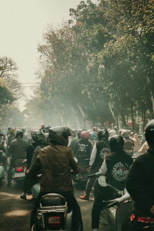 Free A vibrant scooter parade celebrating Indonesia's Independence Day in Bandung, filled with classic motorcycles and retro scooters. Stock Photo