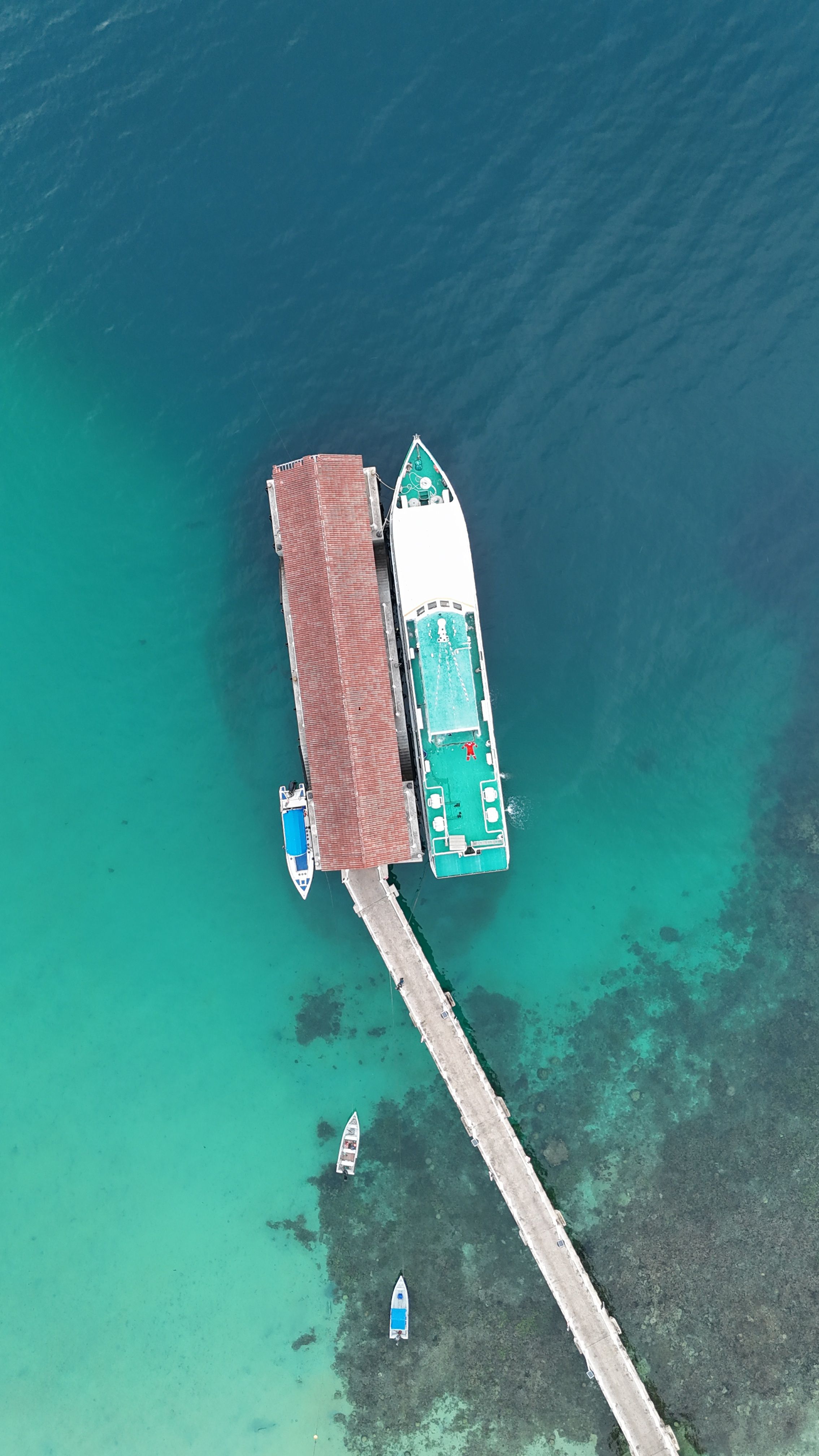 Aerial View of a Pier with Docked Boats · Free Stock Photo