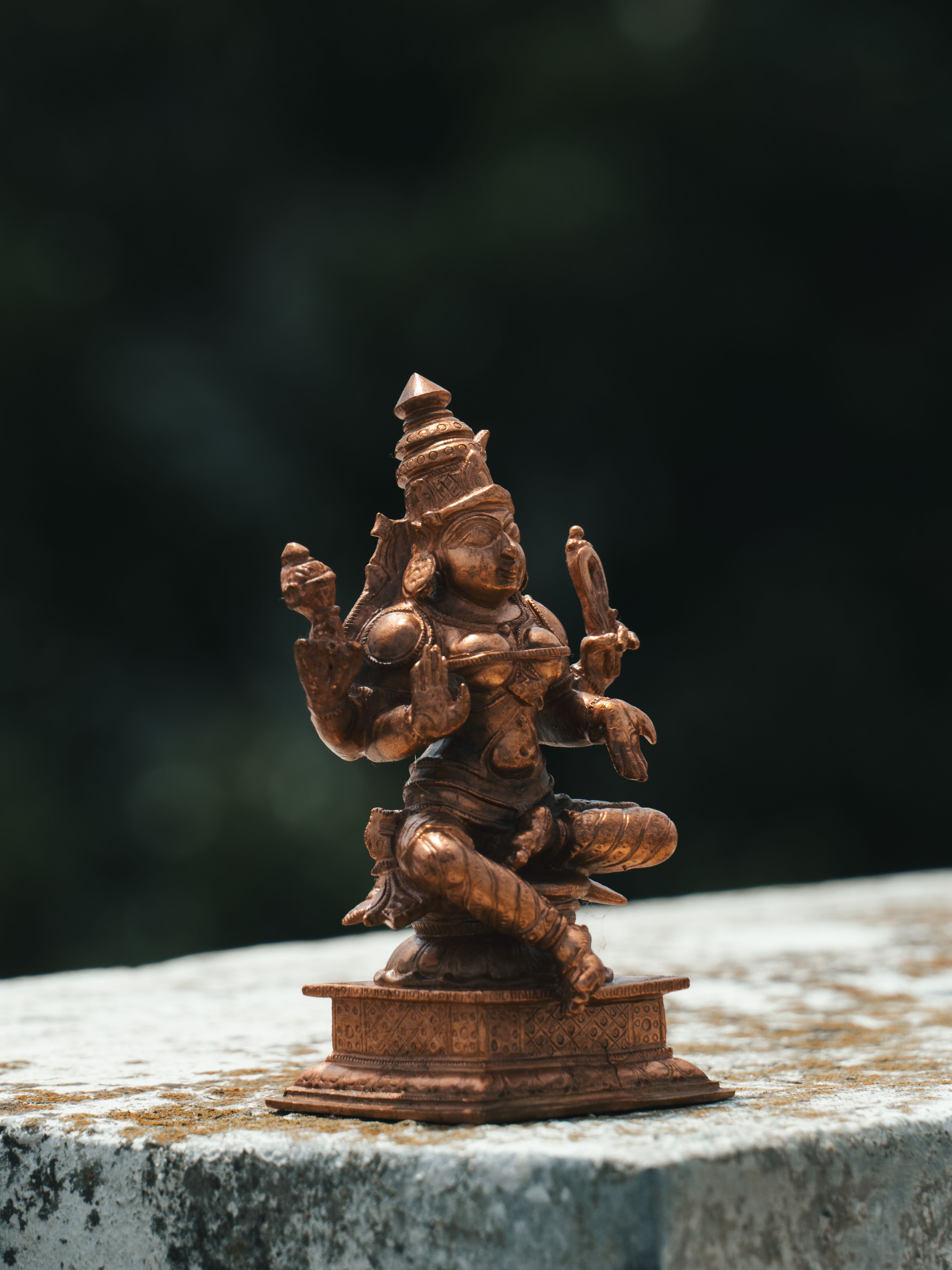 Detailed brass sculpture of a Hindu deity, showcasing intricate craftsmanship and cultural heritage from Bengaluru.