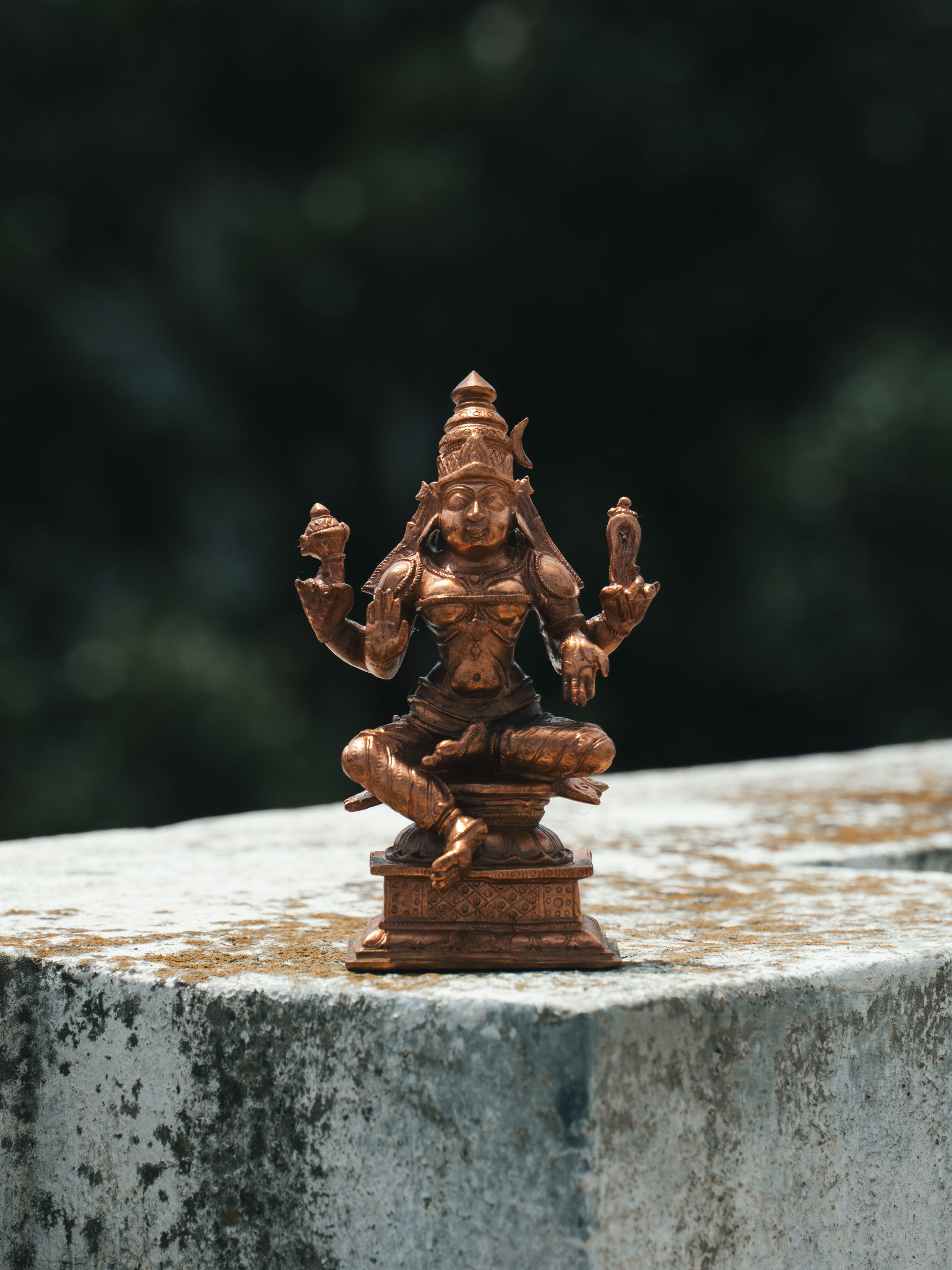 Detailed brass sculpture of a Hindu deity, showcasing artisan craftsmanship in Bengaluru, India.