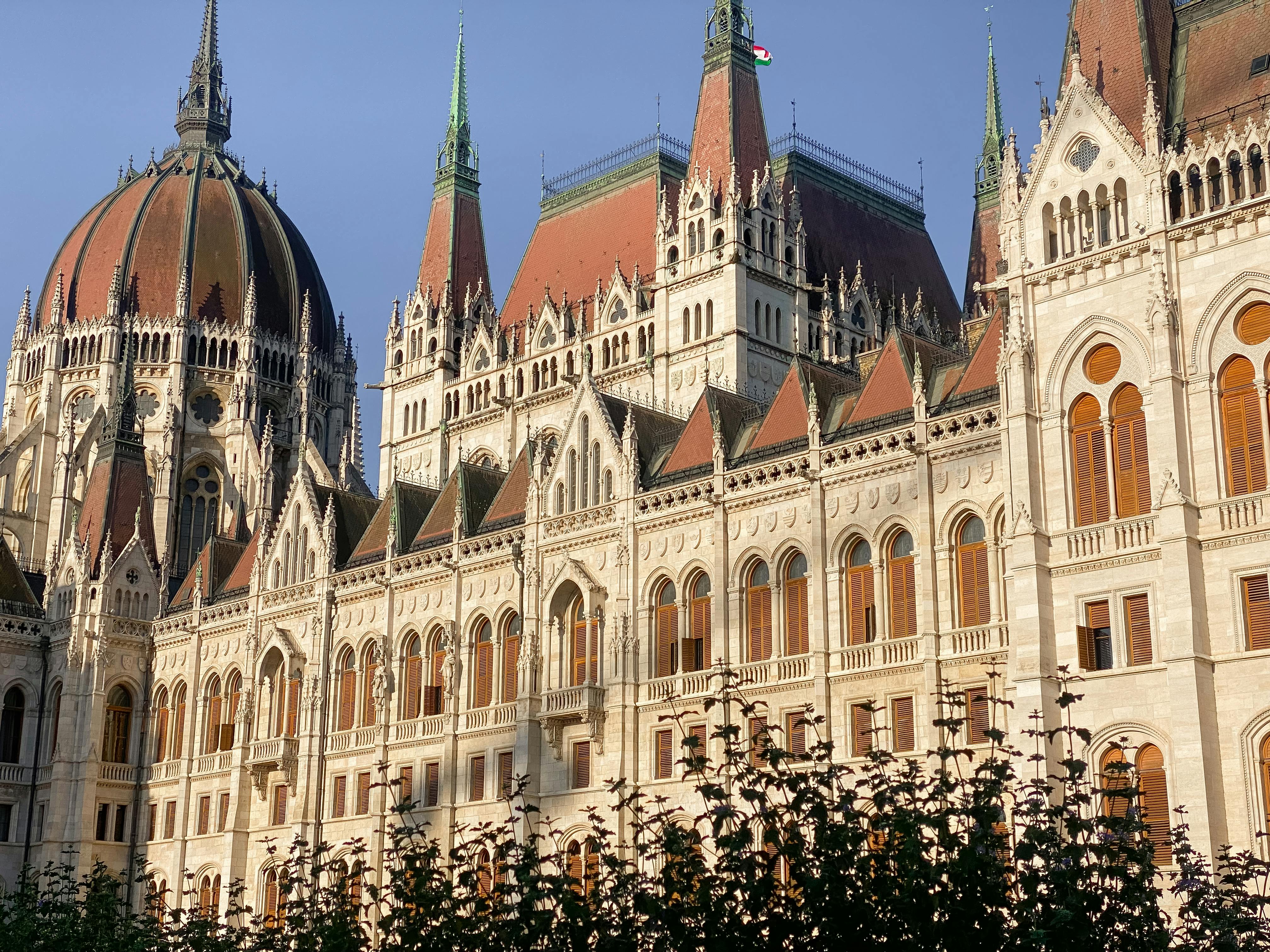View of the iconic Hungarian Parliament Building in Budapest, showcasing its stunning architecture in daylight.