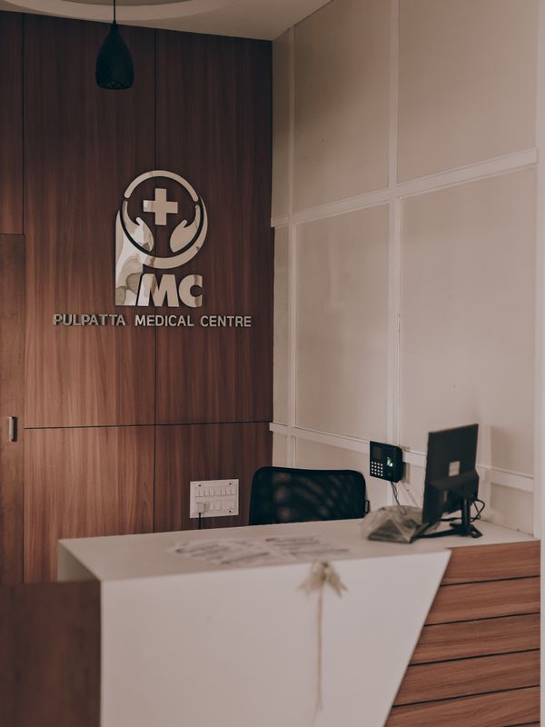 Warm, comfortable reception area at Vitalis Dental Studio